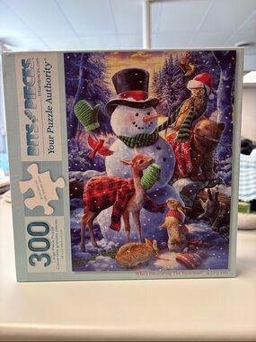Who’s Decorating The Snowman? 300-Piece Puzzle - Festive Winter Scene
